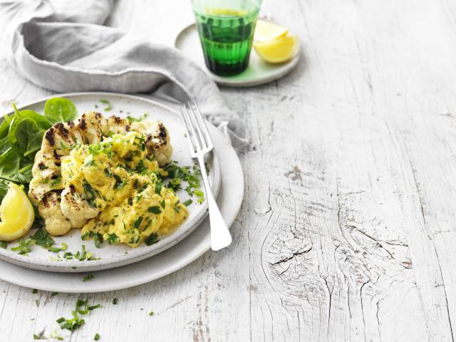 Cauliflower steaks with herbed scramble