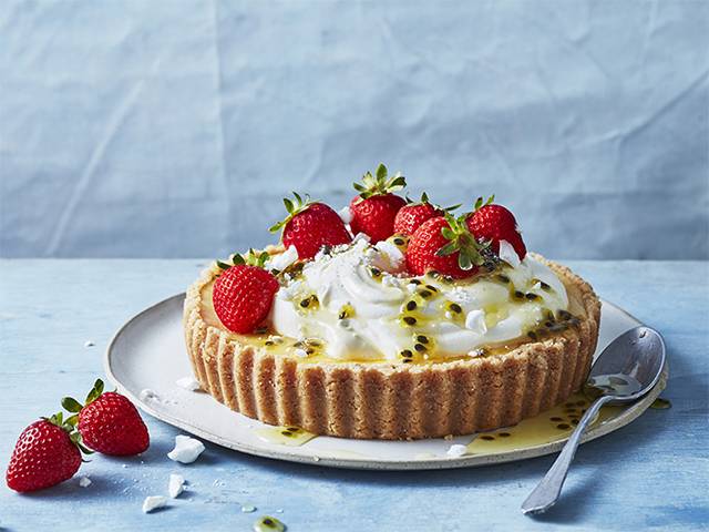 Baked Cheesecake with Strawberries & Passionfruit Syrup