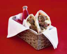 Lamb patties with pita bread, hummus and tabouli