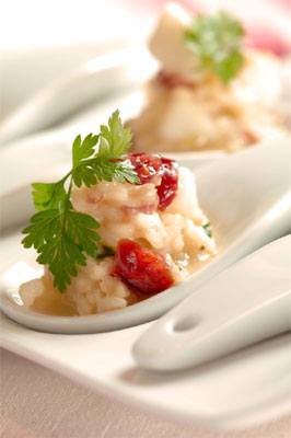 Risotto spoons with scallops, cranberries, parsley, lemon zest & chilli