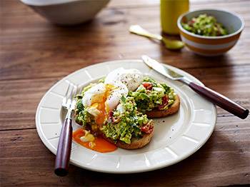 Poached Eggs with Avocado and Feta Smash on Sourdough