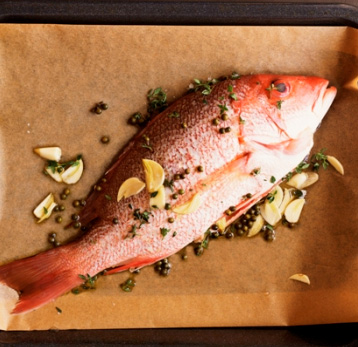 Whole Snapper Baked in Vine Leaf and Salt Herb Crust with Preserved Lemon & Cape